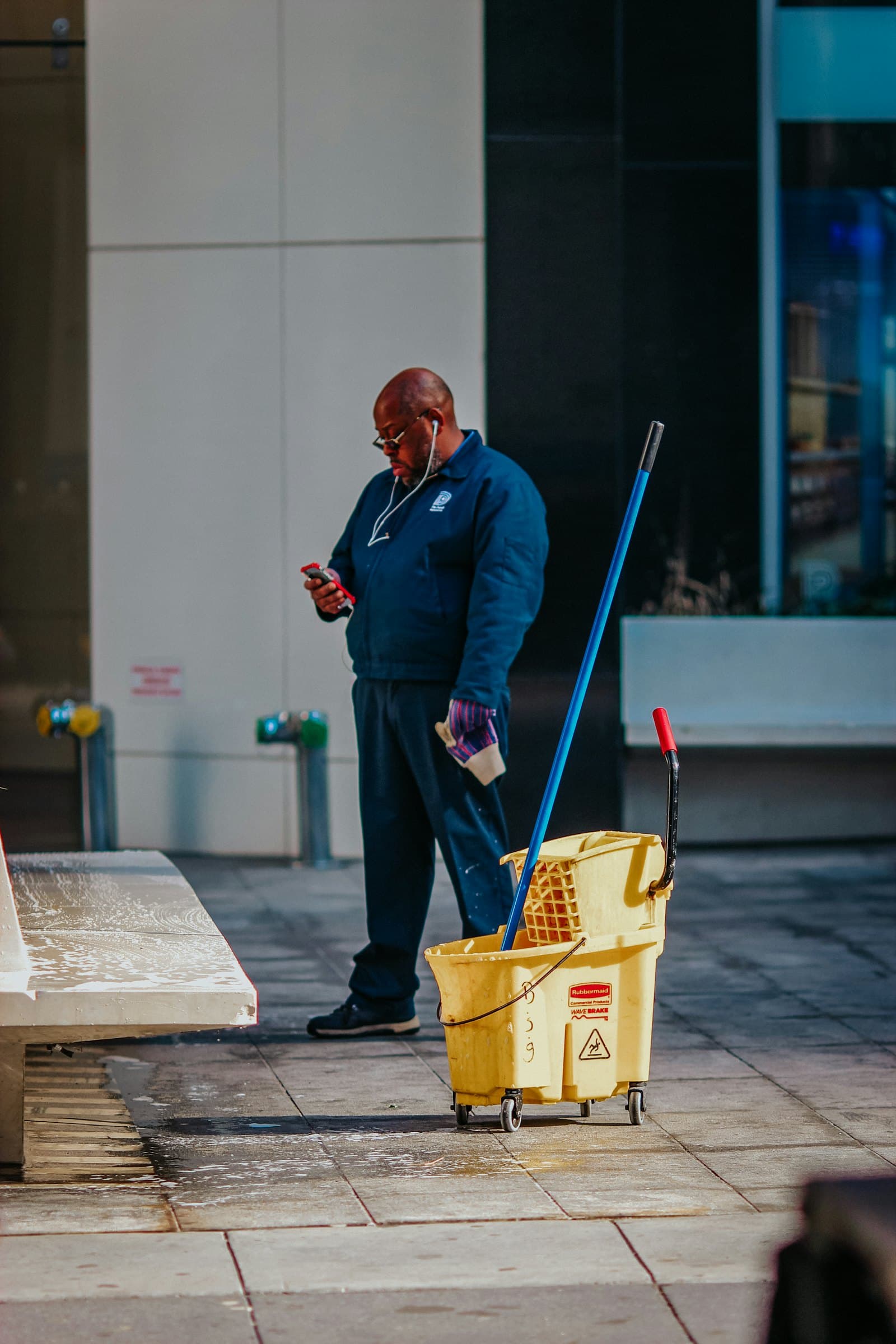 TaskHorse cleaner with mop and bucket in an office