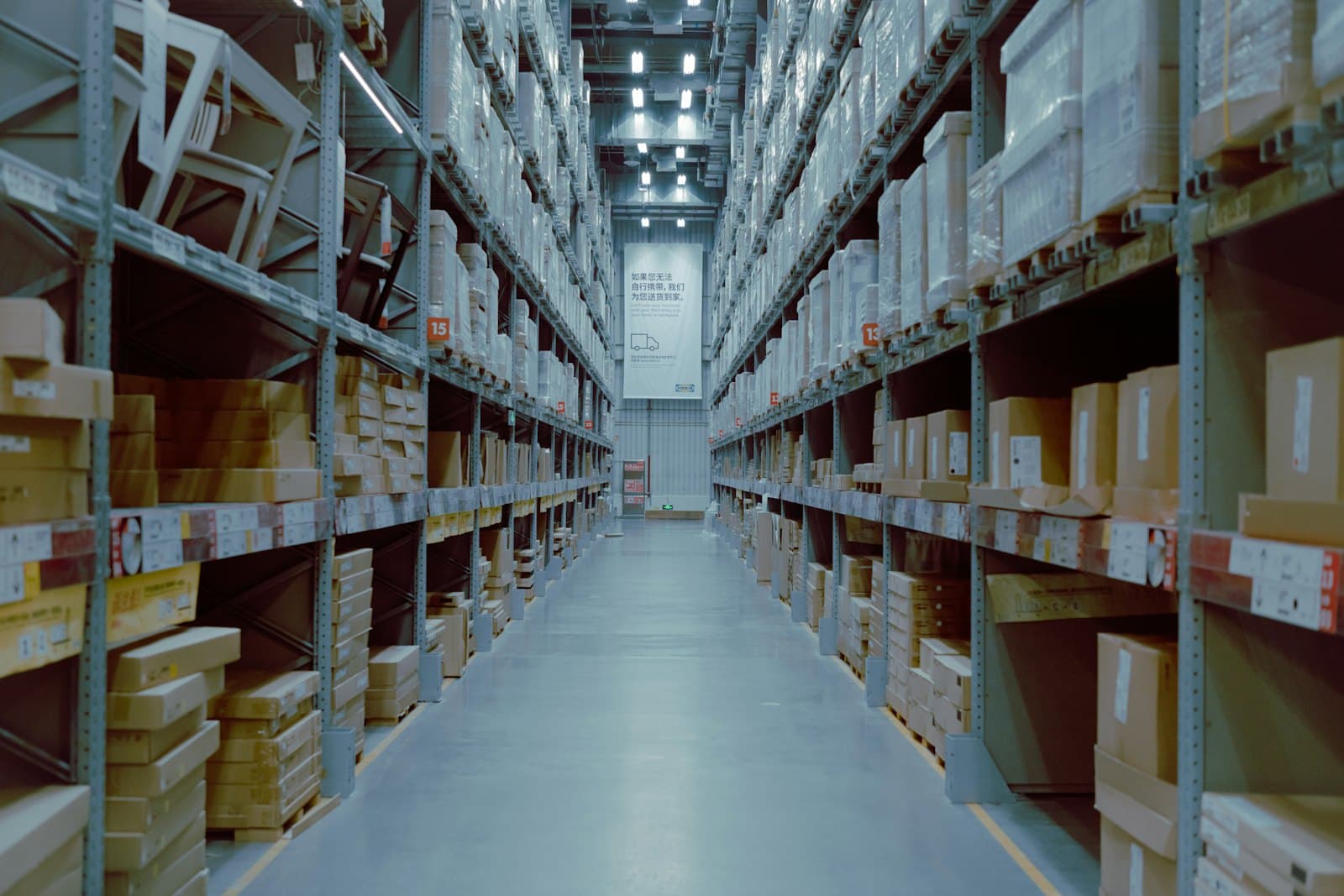 Clean warehouse aisle and organised stock racking